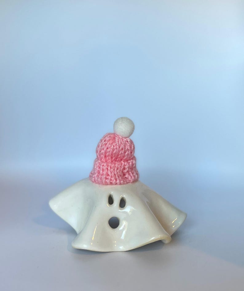 Holiday ceramic ghost figurine with hat